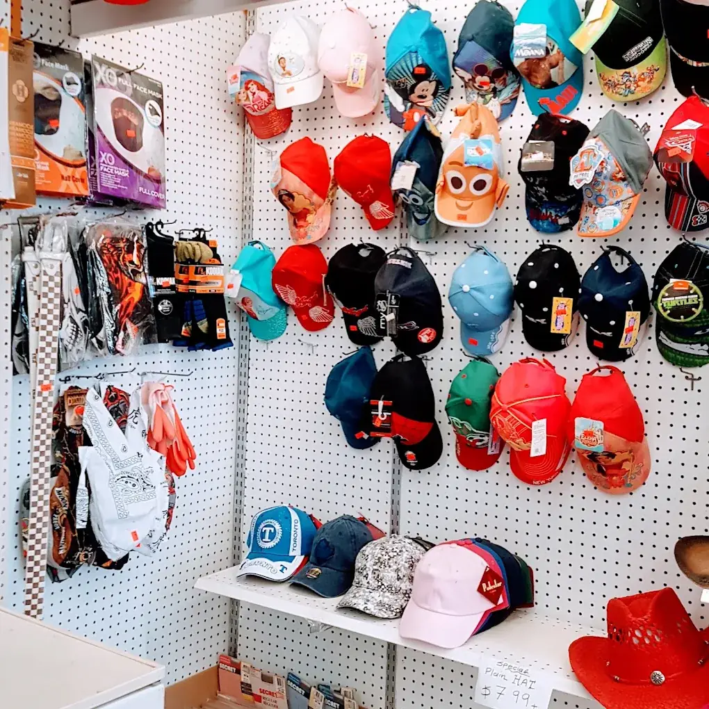 Wall display of hats, caps, gloves and accessories at Eagle Mini Mart